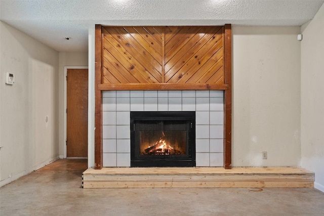 3317 William Cannon Dr Unit A, Austin, TX 78745 - detailed view of finished concrete floors, a tile fireplace, and baseboards