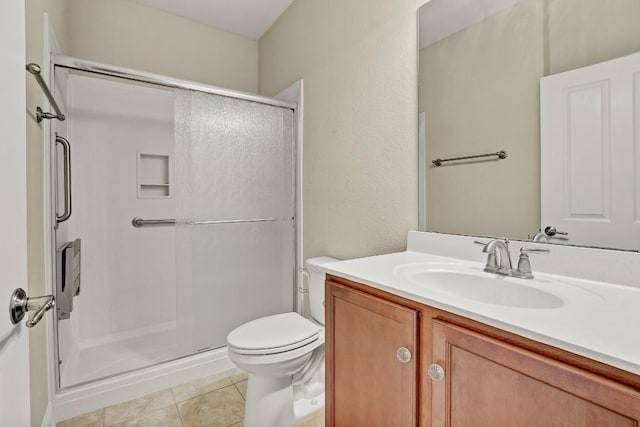 122 Coffee Mill Creek Rd, Georgetown, TX 78633 - full bath featuring a stall shower, toilet, vanity, and tile patterned flooring