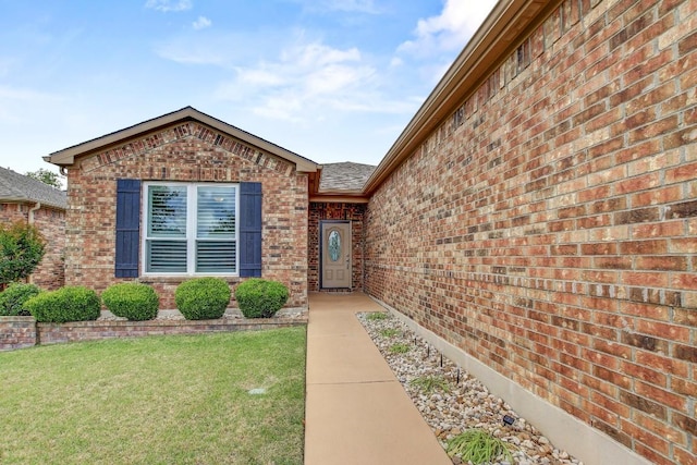 122 Coffee Mill Creek Rd, Georgetown, TX 78633 - property entrance featuring brick siding and a lawn