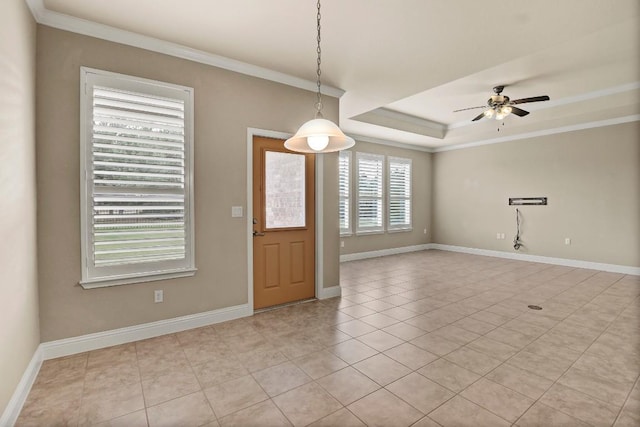 122 Coffee Mill Creek Rd, Georgetown, TX 78633 - entrance foyer featuring a ceiling fan, light tile patterned flooring, baseboards, crown molding, and a raised ceiling