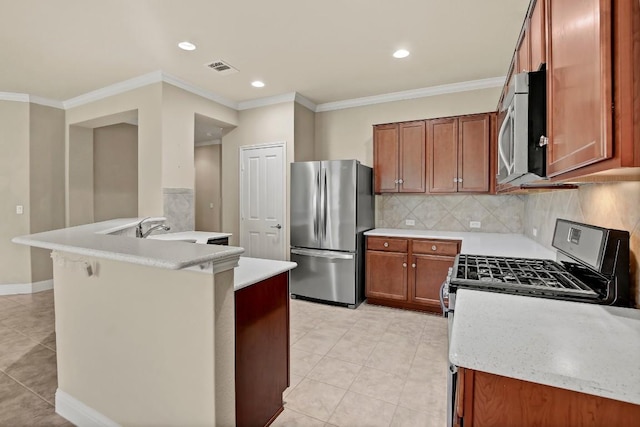 122 Coffee Mill Creek Rd, Georgetown, TX 78633 - kitchen featuring appliances with stainless steel finishes, light tile patterned flooring, crown molding, tasteful backsplash, and brown cabinetry