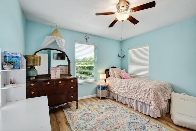 410 Easton Dr, San Marcos, TX 78666 - bedroom featuring wood finished floors, baseboards, and ceiling fan