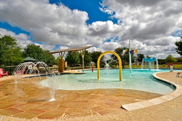410 Easton Dr, San Marcos, TX 78666 - community pool featuring a water play area