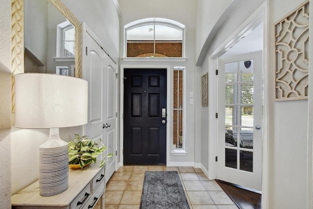 410 Easton Dr, San Marcos, TX 78666 - foyer entrance with light tile patterned floors and a high ceiling