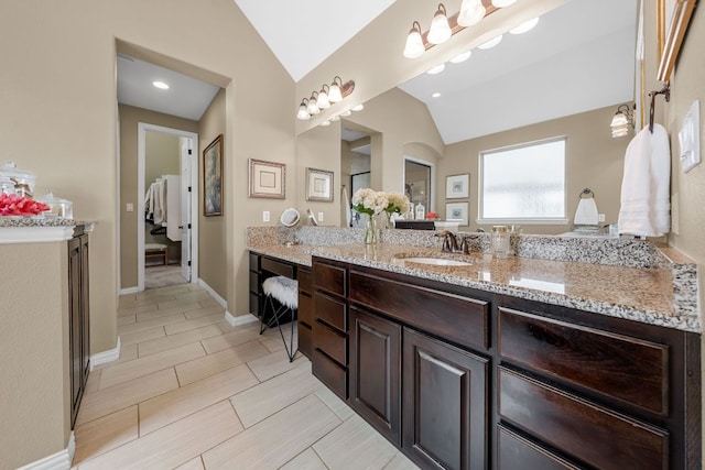 285 Sand Hills Ln, Austin, TX 78737 - bathroom featuring lofted ceiling and vanity