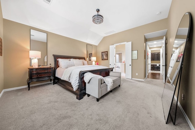 285 Sand Hills Ln, Austin, TX 78737 - bedroom featuring light colored carpet, baseboards, vaulted ceiling, and ensuite bathroom