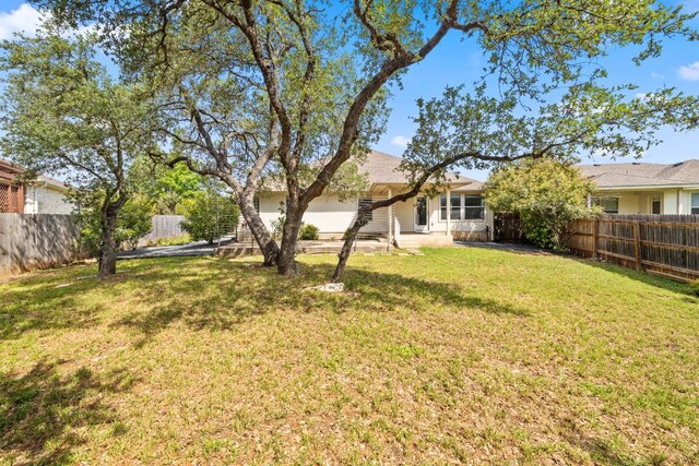 3321 Winding River Trl, Round Rock, TX 78681 - view of yard with a garage and driveway