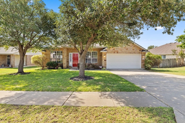 3321 Winding River Trl, Round Rock, TX 78681 - obstructed view of property with an attached garage, driveway, and brick siding
