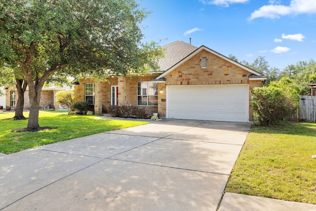 3321 Winding River Trl, Round Rock, TX 78681 - view of front of property featuring stone siding, concrete driveway, and a garage