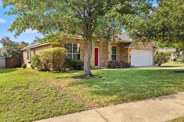 3321 Winding River Trl, Round Rock, TX 78681 - obstructed view of property with a garage, concrete driveway, and stone siding