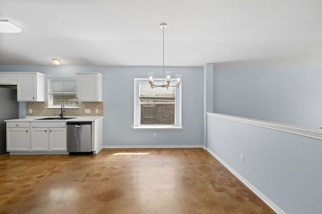 3321 Winding River Trl, Round Rock, TX 78681 - kitchen featuring stainless steel appliances, a sink, a chandelier, white cabinetry, and tasteful backsplash