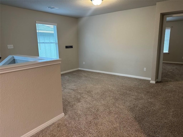 152 Mason Hill Ln, Georgetown, TX 78628 - carpeted spare room featuring baseboards