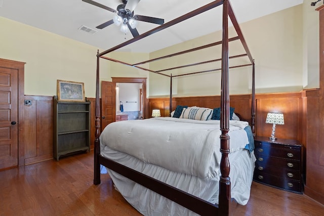 11036 Cherisse Dr, Austin, TX 78739 - bedroom featuring wood finished floors, a wainscoted wall, and wooden walls