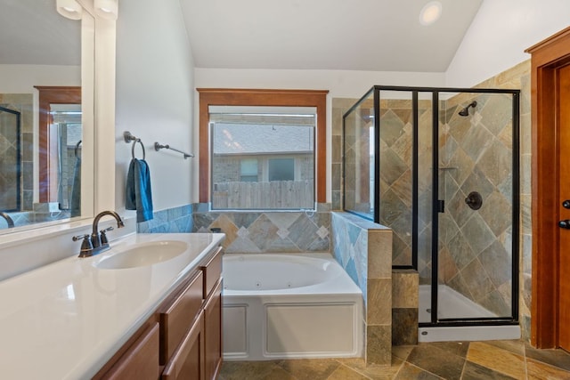 11036 Cherisse Dr, Austin, TX 78739 - full bathroom featuring a stall shower, lofted ceiling, vanity, and a tub with jets