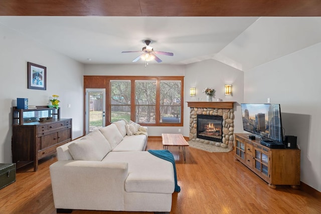 11036 Cherisse Dr, Austin, TX 78739 - living area featuring ceiling fan, a fireplace, and wood finished floors