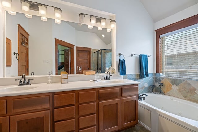 11036 Cherisse Dr, Austin, TX 78739 - bathroom with lofted ceiling, a shower stall, a tub with jets, and double vanity