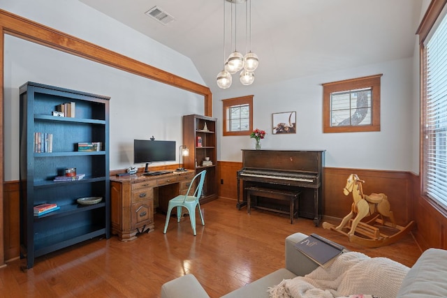 11036 Cherisse Dr, Austin, TX 78739 - office featuring wainscoting, wood finished floors, vaulted ceiling, a chandelier, and wooden walls