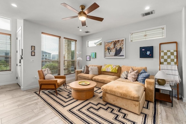 5202 Rob Scott St, Austin, TX 78721 - living room featuring a ceiling fan, plenty of natural light, light wood finished floors, and recessed lighting