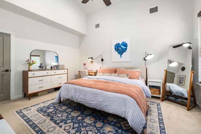 5202 Rob Scott St, Austin, TX 78721 - bedroom featuring light carpet, high vaulted ceiling, and ceiling fan