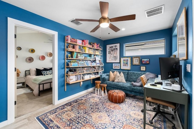 5202 Rob Scott St, Austin, TX 78721 - office area featuring a ceiling fan and wood finished floors