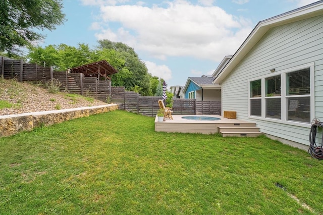 5202 Rob Scott St, Austin, TX 78721 - fenced backyard with an outdoor hot tub and a wooden deck