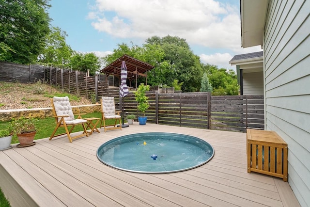 5202 Rob Scott St, Austin, TX 78721 - view of pool with a wooden deck, a fenced backyard, and a hot tub