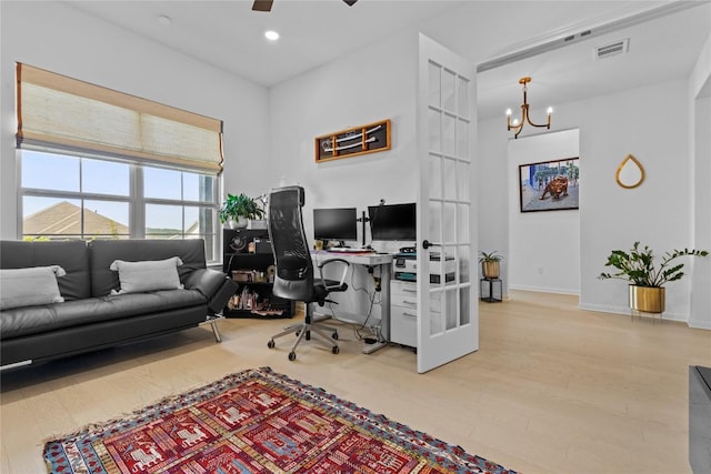 office area with a chandelier, wood finished floors, baseboards, a ceiling fan, and recessed lighting