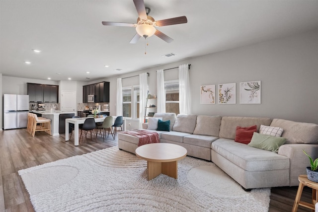 503 Windy Reed Rd, Hutto, TX 78634 - living room with recessed lighting, light wood-style floors, and ceiling fan