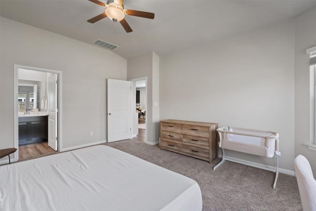 503 Windy Reed Rd, Hutto, TX 78634 - bedroom featuring vaulted ceiling, carpet floors, ensuite bath, ceiling fan, and baseboards