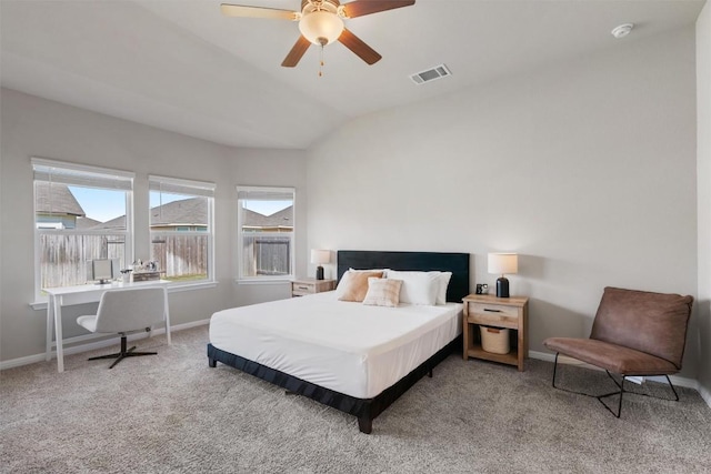 503 Windy Reed Rd, Hutto, TX 78634 - carpeted bedroom with baseboards, vaulted ceiling, and a ceiling fan