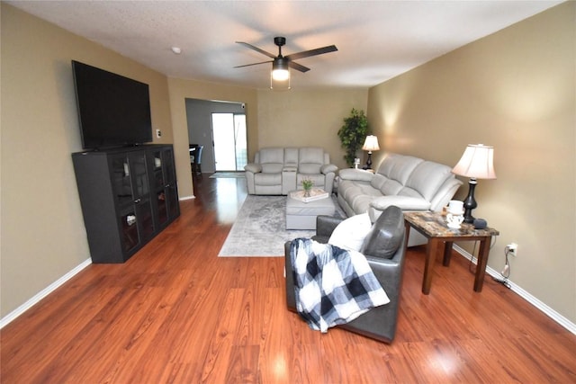2803 Mason Dr, Killeen, TX 76549 - living room featuring ceiling fan, wood finished floors, and baseboards