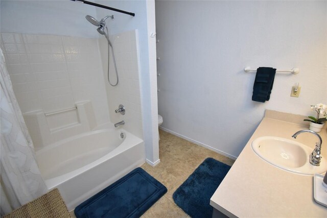 2803 Mason Dr, Killeen, TX 76549 - full bathroom with toilet, vanity, shower / bath combination with curtain, tile patterned floors, and baseboards