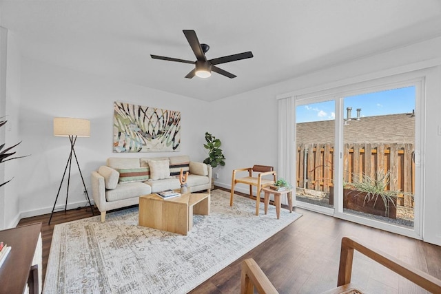 5916 Signal Pt, Austin, TX 78724 - living area featuring wood finished floors, ceiling fan, and baseboards