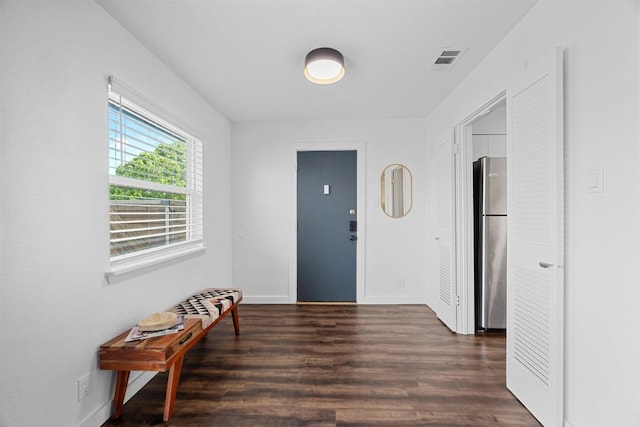 5916 Signal Pt, Austin, TX 78724 - entryway featuring dark wood-type flooring and baseboards