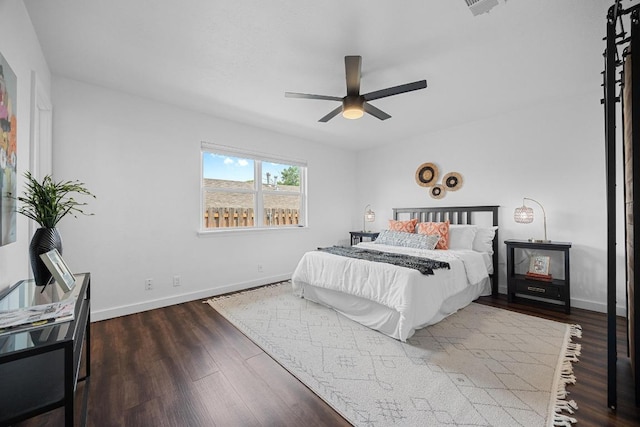 5916 Signal Pt, Austin, TX 78724 - bedroom featuring dark wood-style flooring and ceiling fan
