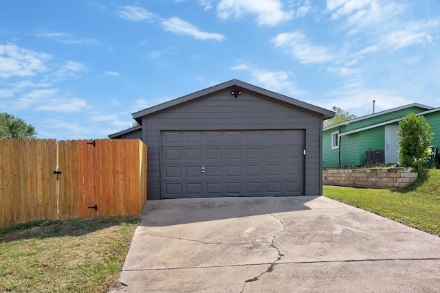 5916 Signal Pt, Austin, TX 78724 - view of front of house with a garage, driveway, and an outdoor structure