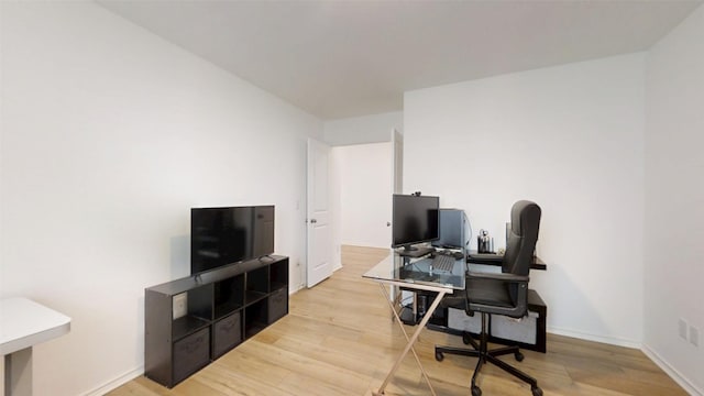 221 Mendoza, Kyle, TX 78640 - home office with light wood-style floors and baseboards