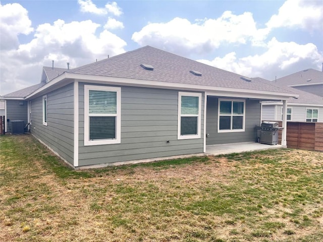 221 Mendoza, Kyle, TX 78640 - rear view of house with a patio area and central AC