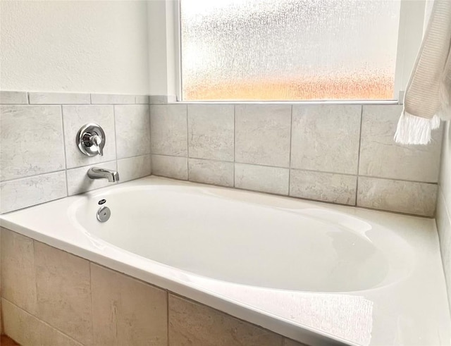 221 Mendoza, Kyle, TX 78640 - bathroom featuring a garden tub