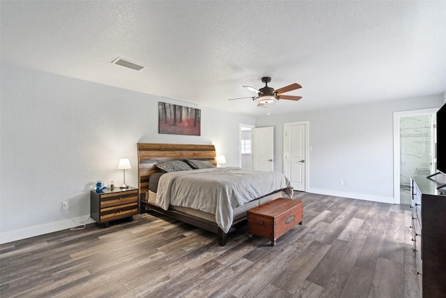 361 Whispering Hollow Dr, Kyle, TX 78640 - bedroom featuring wood finished floors, baseboards, a textured ceiling, and a ceiling fan