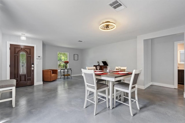 361 Whispering Hollow Dr, Kyle, TX 78640 - dining space with concrete flooring and baseboards