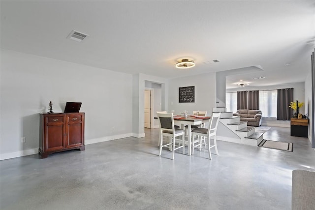 361 Whispering Hollow Dr, Kyle, TX 78640 - dining space featuring concrete floors and baseboards