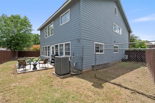 361 Whispering Hollow Dr, Kyle, TX 78640 - rear view of property featuring cooling unit, a patio, and outdoor lounge area