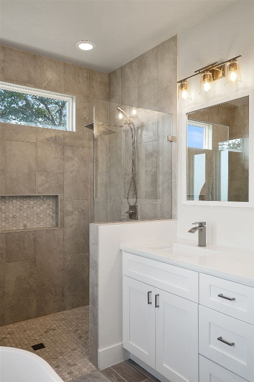 20704 Leaning Oak Dr, Lago Vista, TX 78645 - bathroom with a walk in shower and vanity