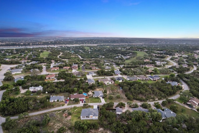 20704 Leaning Oak Dr, Lago Vista, TX 78645 - aerial view at dusk of a residential view