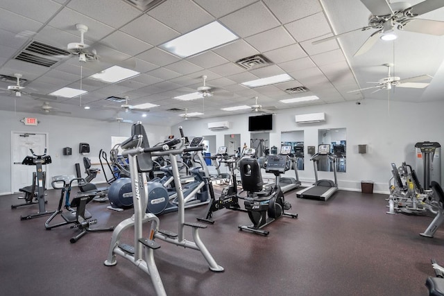 20704 Leaning Oak Dr, Lago Vista, TX 78645 - gym with a ceiling fan, a wall unit AC, and a drop ceiling