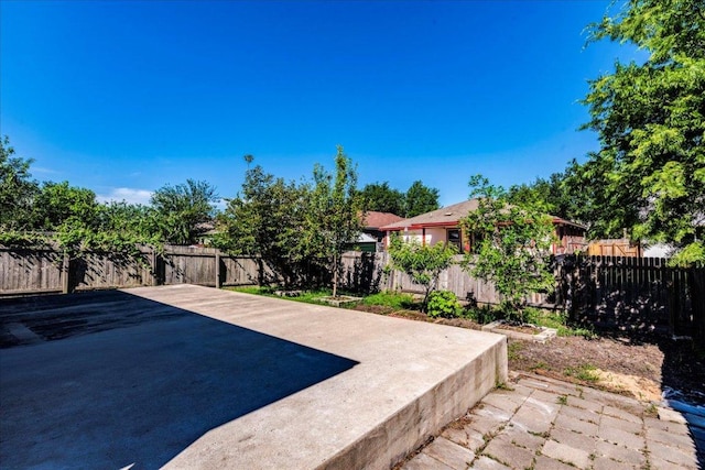 view of patio with a fenced backyard