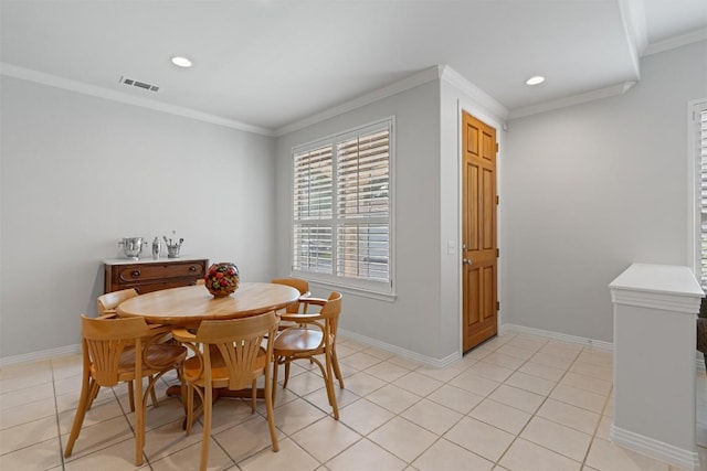 11558 Spicewood Pkwy Unit 7, Austin, TX 78750 - dining space featuring crown molding, recessed lighting, baseboards, and light tile patterned floors