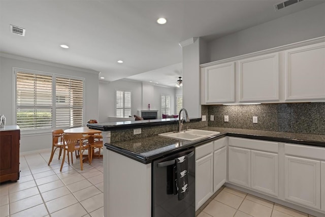 11558 Spicewood Pkwy Unit 7, Austin, TX 78750 - kitchen featuring a sink, dishwashing machine, ceiling fan, light tile patterned floors, and recessed lighting