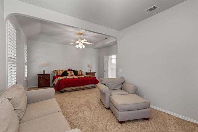 11558 Spicewood Pkwy Unit 7, Austin, TX 78750 - bedroom featuring arched walkways, carpet flooring, and baseboards